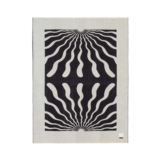 The Blacksaw Dopamine Psychedelic Art Blanket in Black/Ivory Flat laying product shot