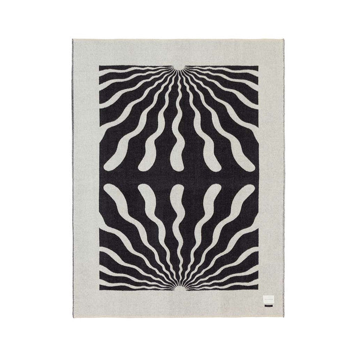 The Blacksaw Dopamine Psychedelic Art Blanket in Black/Ivory Flat laying product shot