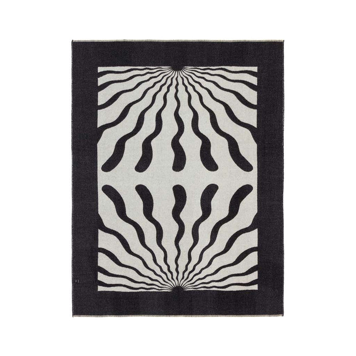 The Blacksaw Dopamine Psychedelic Art Blanket in Black/Ivory Flat laying product shot Reverse side